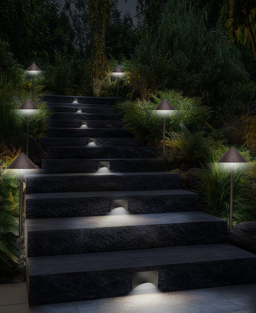 NuWatt outdoor pathway lights and step lights in a night backyard landscape