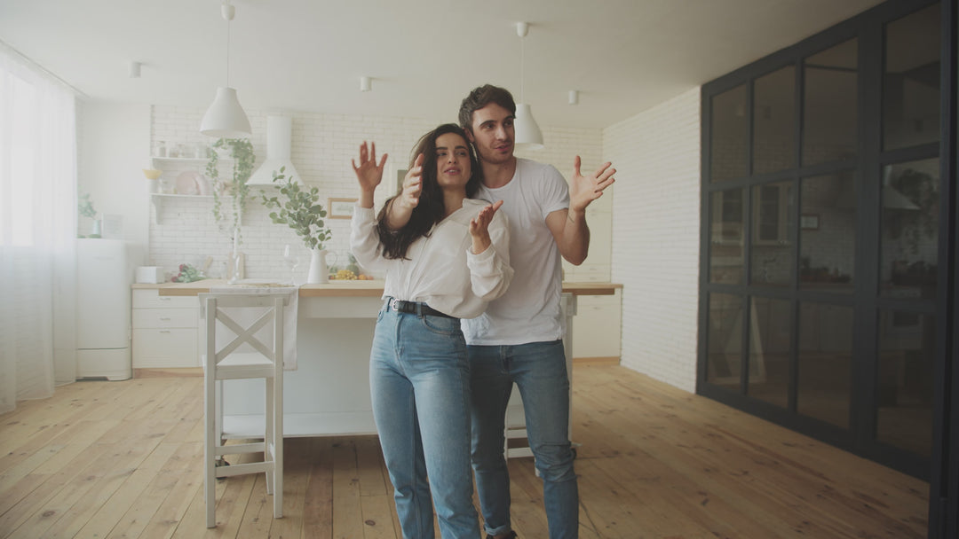 Couple lighting up their new kitchen
